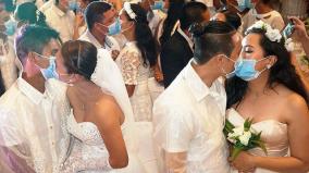 新型コロナ対策・フィリピン集団結婚式でマスク越しキス