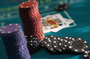89650862-chips-at-casino-table-with-cards-on-table.jpg