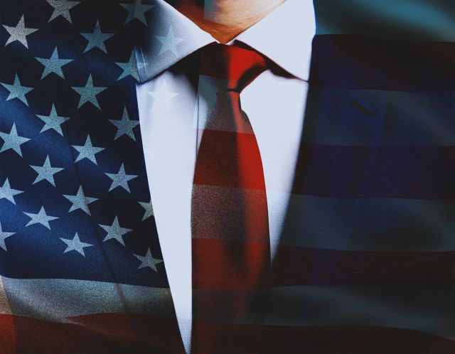 アメリカ国旗のスーツを着た男性