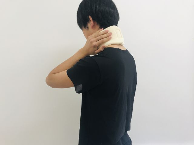 むちうちの男性