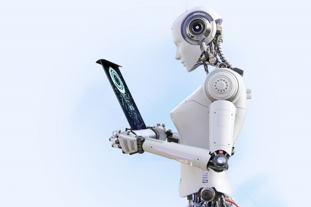 タブレットを見るロボット