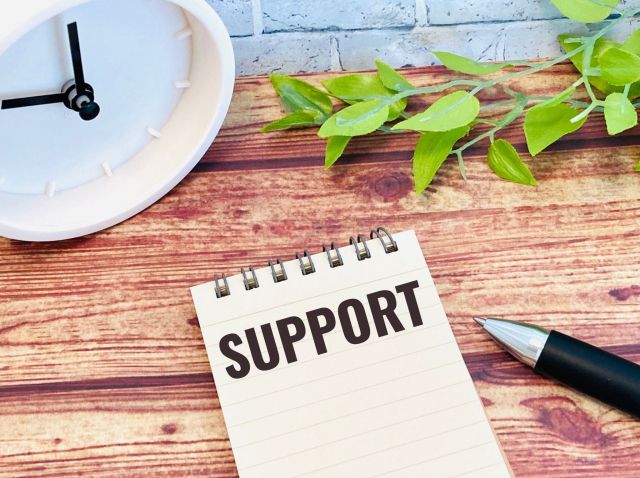 SUPPORTと書かれたメモ